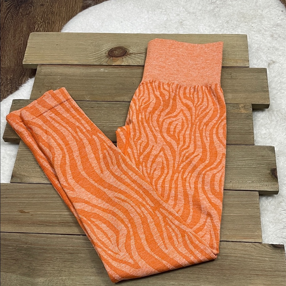 NVGTN Burnt Orange Zebra Seamless Leggings